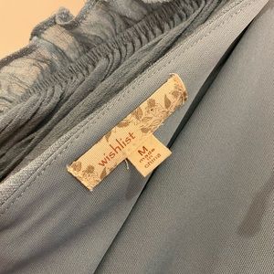 Light blue romper with open shoulders and back!